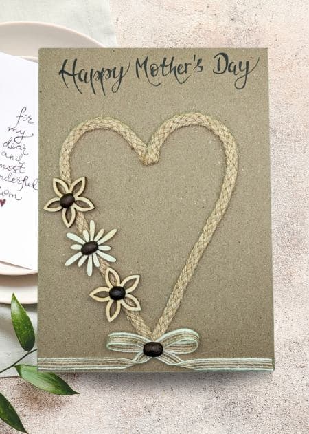 A handmade Mother’s Day card featuring colourful flowers and a heart is part of a collection banner.