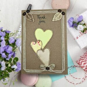Handmade thank you card featuring colourful hearts, expressing gratitude in a heartfelt design.