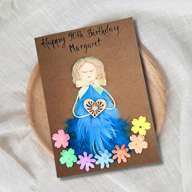 Handmade 90th birthday card – personalised for a women, crafted with blue feathers, wood and paper, thoughtful gift idea for her mileston.