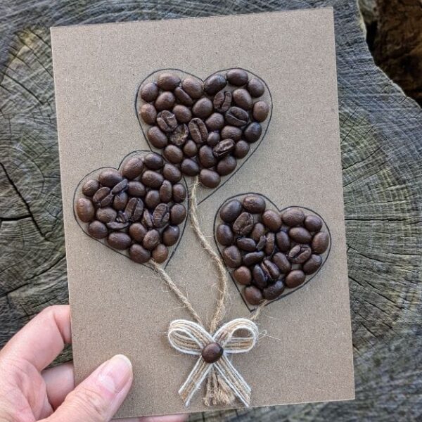 Cute Handmade Valentine's Day Card 2 Heart-shaped coffee beans displayed on an easel, featured on a cute handmade Valentines card.