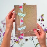 Handmade Valentines Day card featuring burlap hearts, lace trim, rustic kraft card background and twine bow, romantic eco-friendly design